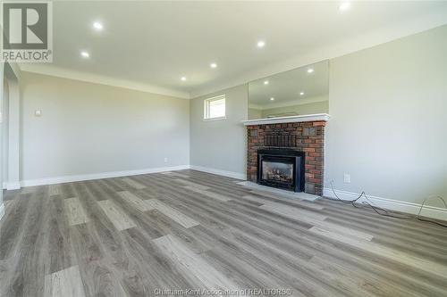 6549 8Th Line, North Buxton, ON - Indoor Photo Showing Living Room With Fireplace