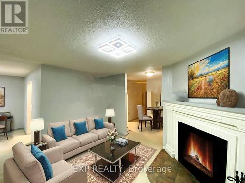 Main - 306 Edgehill Drive, Barrie, ON - Indoor Photo Showing Living Room With Fireplace