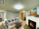 Main - 306 Edgehill Drive, Barrie, ON  - Indoor Photo Showing Living Room With Fireplace 