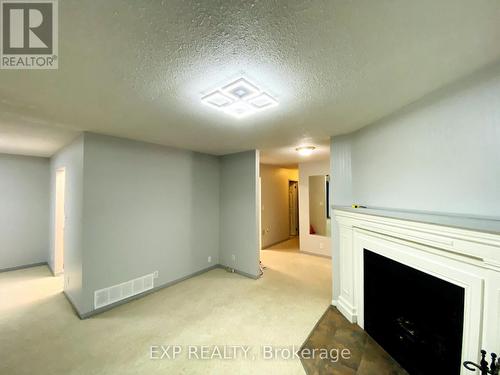 Main - 306 Edgehill Drive, Barrie, ON - Indoor Photo Showing Other Room With Fireplace