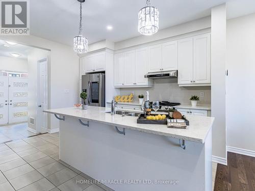 12 Callahan Court, Brampton, ON - Indoor Photo Showing Kitchen With Upgraded Kitchen