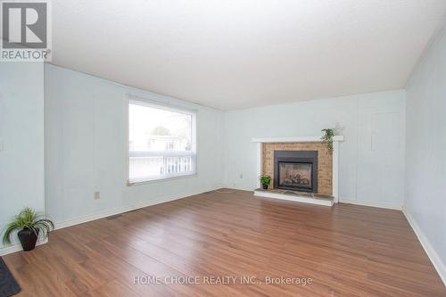 16 The Cove Road, Clarington, ON - Indoor Photo Showing Living Room With Fireplace