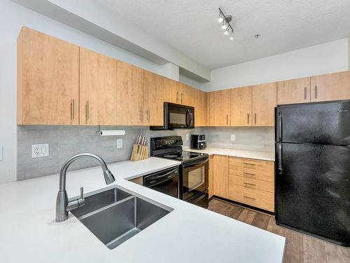 110-825 Goldstream Ave, Langford, BC - Indoor Photo Showing Kitchen With Double Sink