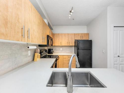 110-825 Goldstream Ave, Langford, BC - Indoor Photo Showing Kitchen With Double Sink