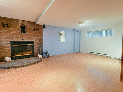 Salle familiale - 4090 Rue Legault, Longueuil (Saint-Hubert), QC - Indoor With Fireplace