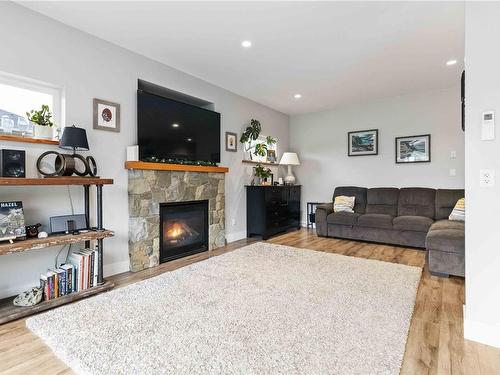 7133 Grant Rd West, Sooke, BC - Indoor Photo Showing Living Room With Fireplace