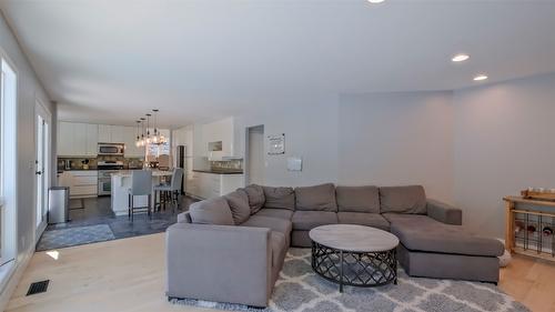 359 Stellar Drive, Kelowna, BC - Indoor Photo Showing Living Room With Fireplace