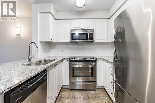 217 - 60 Via Rosedale Way, Brampton, ON - Indoor Photo Showing Kitchen With Stainless Steel Kitchen With Double Sink With Upgraded Kitchen