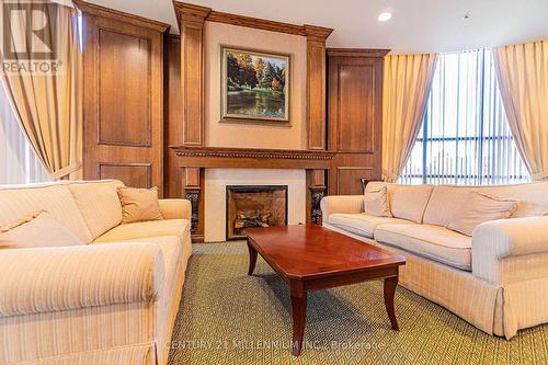 217 - 60 Via Rosedale Way, Brampton, ON - Indoor Photo Showing Living Room With Fireplace