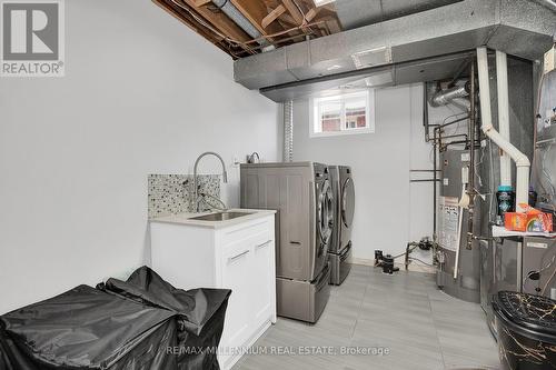 Lower - 99 Willis Road, Vaughan, ON - Indoor Photo Showing Laundry Room