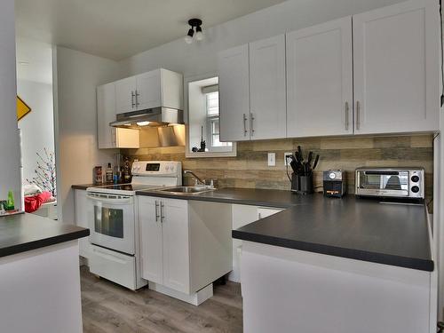 Cuisine - 5175  - 5185 Rue Des Seigneurs E., Saint-Hyacinthe, QC - Indoor Photo Showing Kitchen With Double Sink