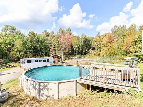 Pool - 136Z Rue Jimmy, Sainte-Sophie, QC - Outdoor With Above Ground Pool