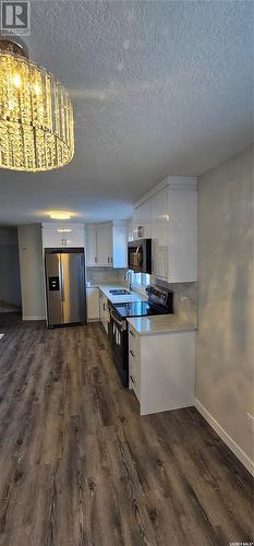 1149 K Avenue N, Saskatoon, SK - Indoor Photo Showing Kitchen With Double Sink