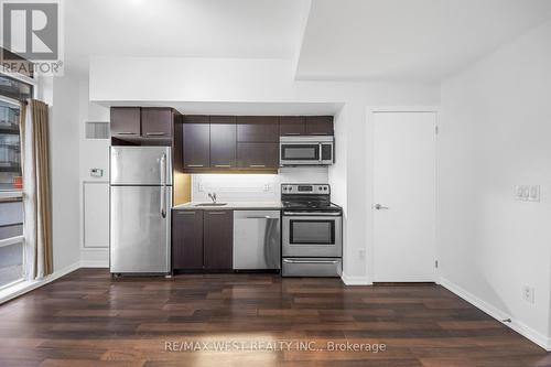 302 - 38 Joe Shuster Way, Toronto, ON - Indoor Photo Showing Kitchen