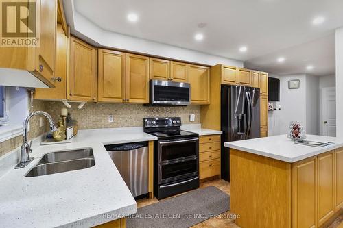 25 Heartview Road, Brampton, ON - Indoor Photo Showing Kitchen With Double Sink