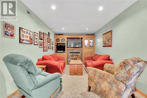 405 Laurier Drive, Lasalle, ON - Indoor Photo Showing Living Room With Fireplace