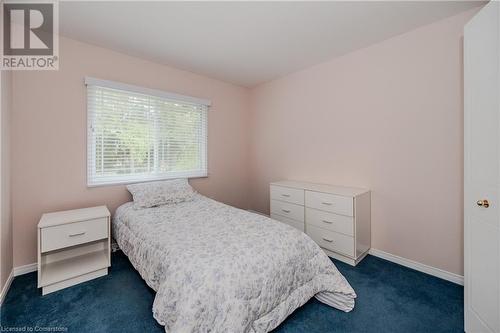 Bedroom featuring dark colored carpet - 435 Shadow Wood Crescent, Waterloo, ON - Indoor Photo Showing Bedroom