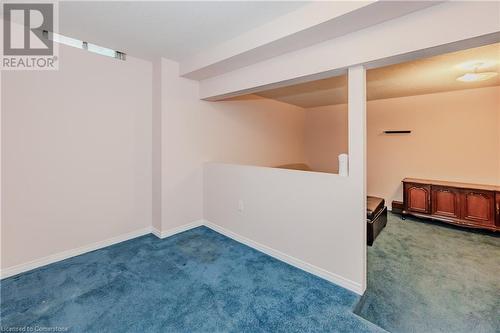 View of carpeted empty room - 435 Shadow Wood Crescent, Waterloo, ON - Indoor Photo Showing Other Room