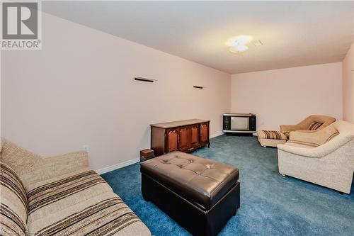 View of carpeted living room - 435 Shadow Wood Crescent, Waterloo, ON - Indoor Photo Showing Living Room