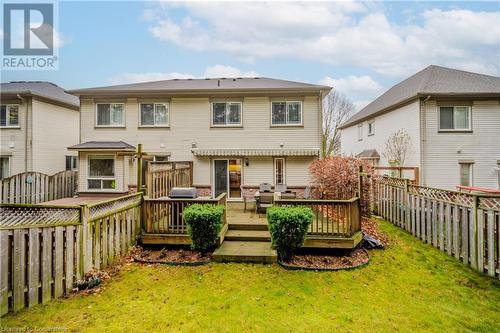 Back of property with a wooden deck, an outdoor living space, and a yard - 435 Shadow Wood Crescent, Waterloo, ON - Outdoor With Deck Patio Veranda With Exterior