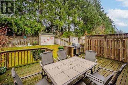 Wooden deck featuring a lawn and a storage unit - 435 Shadow Wood Crescent, Waterloo, ON - Outdoor With Deck Patio Veranda