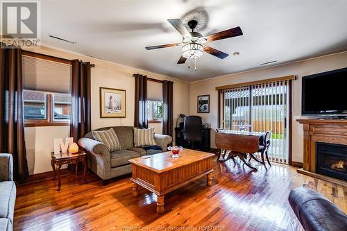 1462 County Rd 22, Lakeshore, ON - Indoor Photo Showing Living Room With Fireplace