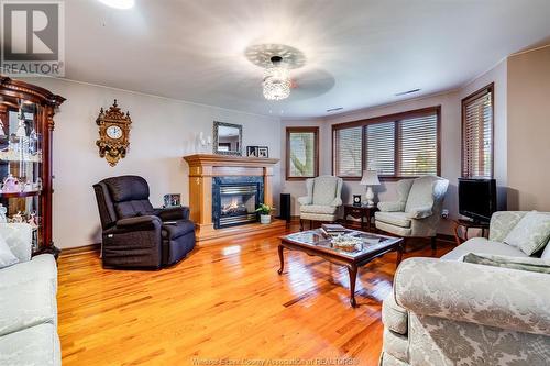 1462 County Rd 22, Lakeshore, ON - Indoor Photo Showing Living Room With Fireplace