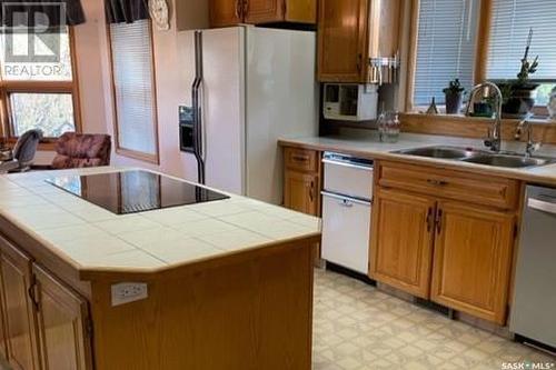 525 Fir Crescent, Carrot River, SK - Indoor Photo Showing Kitchen With Double Sink