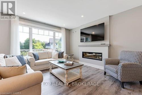 11 New Haven Gate W, Westport, ON - Indoor Photo Showing Living Room With Fireplace