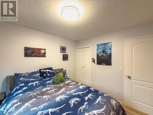 2nd bedroom main level - 766 Favell Court, Kelowna, BC - Indoor Photo Showing Bedroom