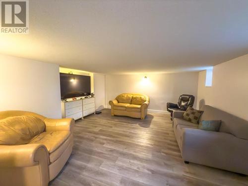 legal suite living room - 766 Favell Court, Kelowna, BC - Indoor Photo Showing Living Room