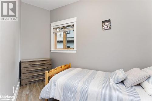 Bedroom featuring hardwood / wood-style floors - 3298 Seydel Lane Lane, Coldwater, ON - Indoor Photo Showing Bedroom