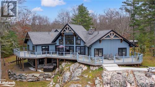 Back of house with a deck - 3298 Seydel Lane Lane, Coldwater, ON - Outdoor With Deck Patio Veranda