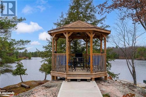 View of dock featuring a gazebo and a water view - 3298 Seydel Lane Lane, Coldwater, ON - Outdoor With Body Of Water With Deck Patio Veranda With Backyard