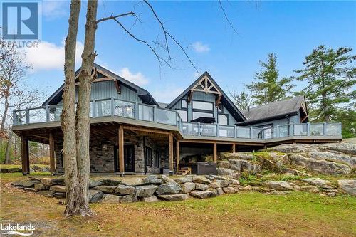 Rear view of property featuring a wooden deck - 3298 Seydel Lane Lane, Coldwater, ON - Outdoor With Deck Patio Veranda