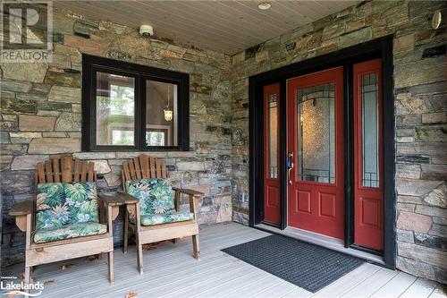 Property entrance with a porch - 3298 Seydel Lane Lane, Coldwater, ON - Outdoor With Deck Patio Veranda