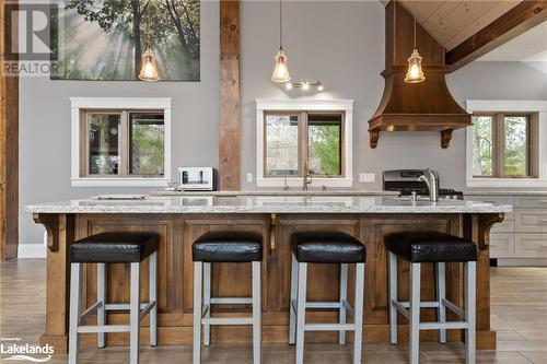 Kitchen with a kitchen breakfast bar and plenty of natural light - 3298 Seydel Lane Lane, Coldwater, ON - Indoor