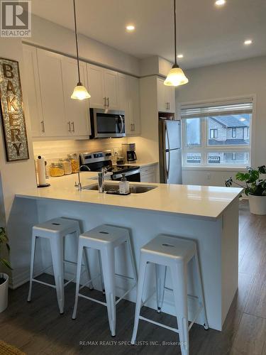 7 - 51 Sparrow Avenue, Cambridge, ON - Indoor Photo Showing Kitchen With Stainless Steel Kitchen With Double Sink With Upgraded Kitchen