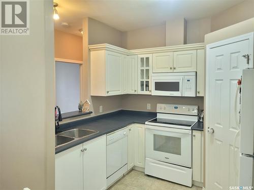 200 302 Nelson Road, Saskatoon, SK - Indoor Photo Showing Kitchen With Double Sink