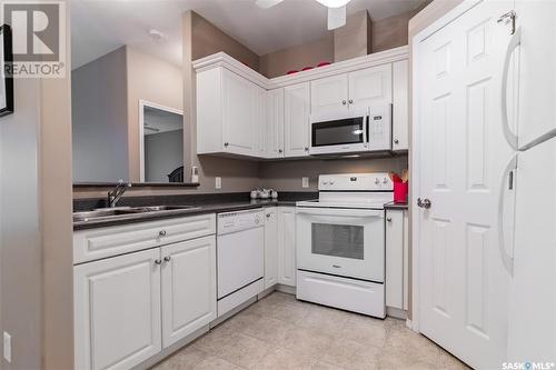 200 302 Nelson Road, Saskatoon, SK - Indoor Photo Showing Kitchen With Double Sink