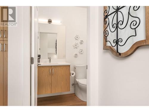 powder room on main level - 105 Predator Ridge Drive Unit# 3, Vernon, BC - Indoor Photo Showing Bathroom