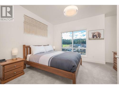 bedroom 1 upper level - 105 Predator Ridge Drive Unit# 3, Vernon, BC - Indoor Photo Showing Bedroom