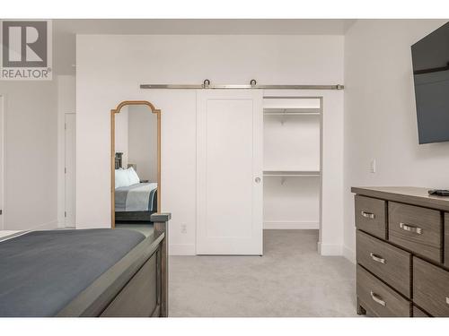 primary bedroom with walk in closet - 105 Predator Ridge Drive Unit# 3, Vernon, BC - Indoor