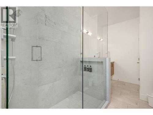 walk in shower in ensuite - 105 Predator Ridge Drive Unit# 3, Vernon, BC - Indoor Photo Showing Bathroom