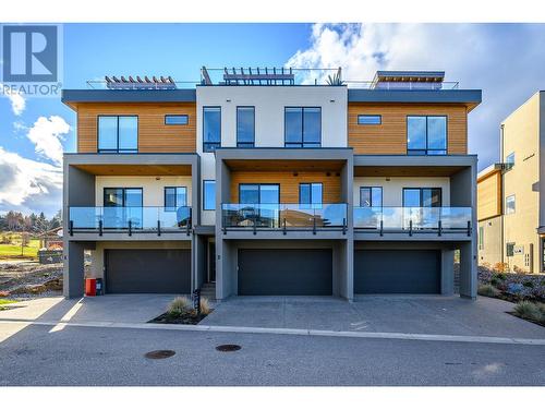 Unit 3 on right side - 105 Predator Ridge Drive Unit# 3, Vernon, BC - Outdoor With Balcony With Facade