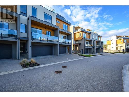 105 Predator Ridge Drive Unit# 3, Vernon, BC - Outdoor With Balcony With Facade