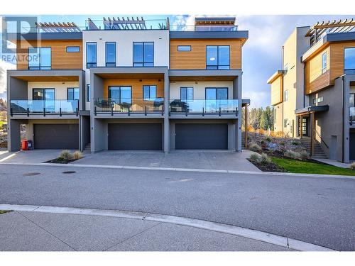 105 Predator Ridge Drive Unit# 3, Vernon, BC - Outdoor With Balcony With Facade