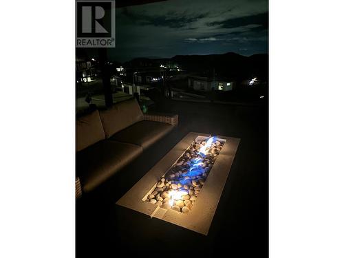 Patio at night - owner photo - 105 Predator Ridge Drive Unit# 3, Vernon, BC - 