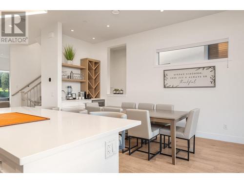 from kitchen to dining - 105 Predator Ridge Drive Unit# 3, Vernon, BC - Indoor Photo Showing Dining Room