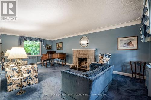 16 Durham Road, Hamilton, ON - Indoor Photo Showing Living Room With Fireplace